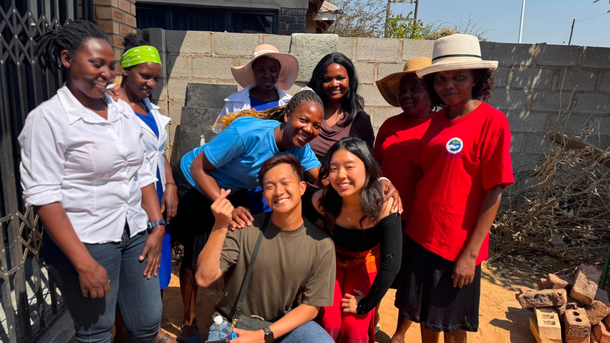 Joel with the team and women from the sewing project in Zimbabwe